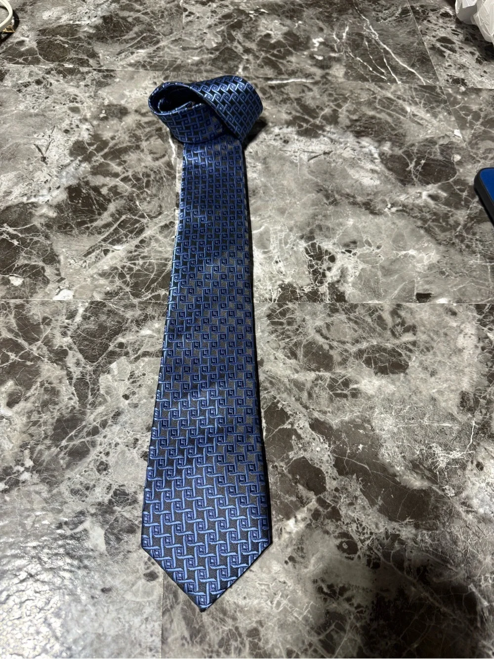 Men’s WeiShang tie in purple/blue/black geometric print